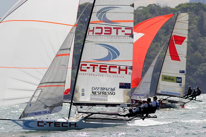 C-Tech and 7 side by side down the first run - JJ Giltinan 18ft Skiff Championship 2014 © Australian 18 Footers League http://www.18footers.com.au
